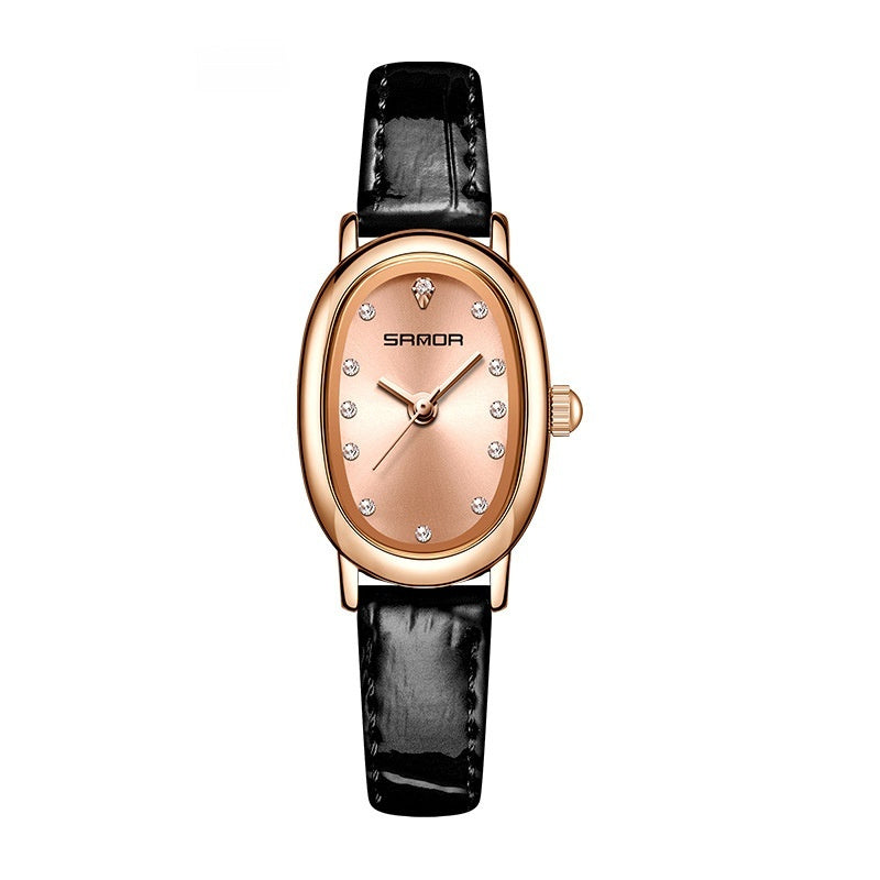 Rose gold watch with black leather strap on a white background