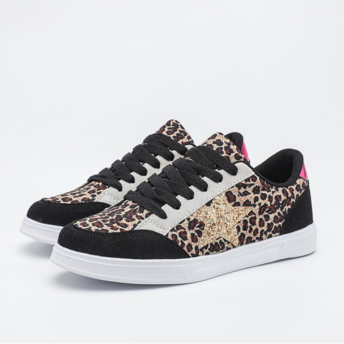 Pair of sneakers with leopard print and glittery accents on a white background