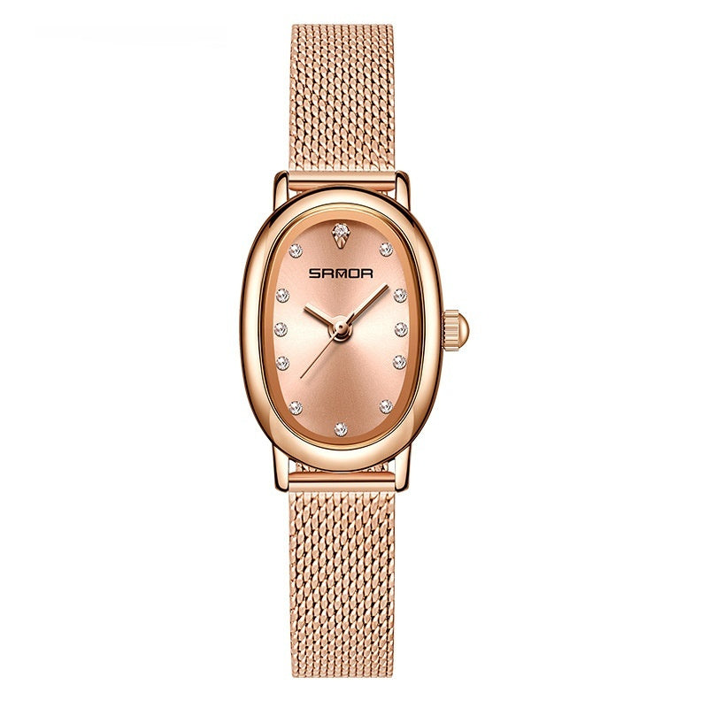 Rose gold watch with mesh band on a white background
