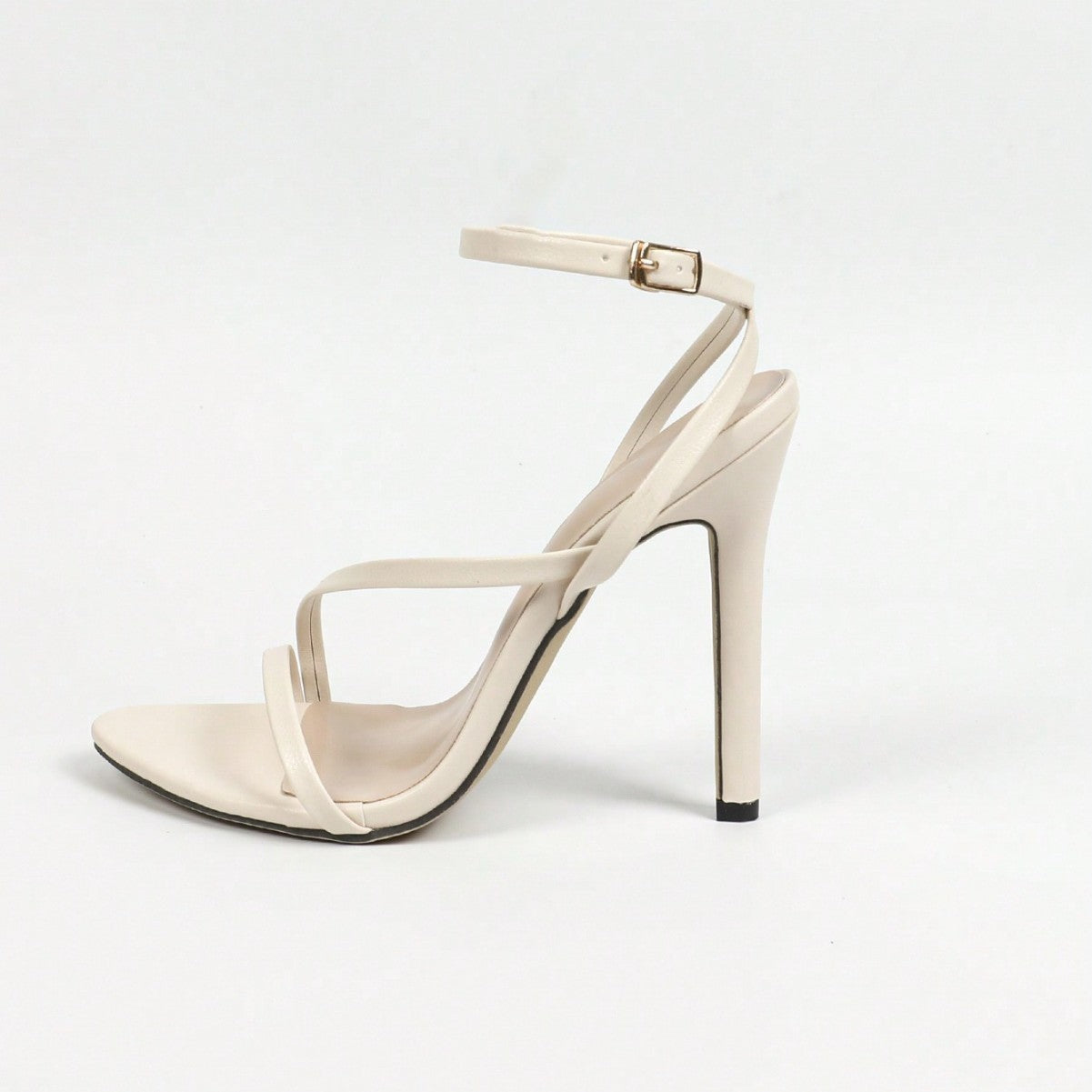 Beige high-heeled sandal on a white background